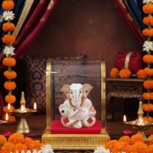 Elegant Shweta Ganesha Idol in Gold-Trimmed Glass Case